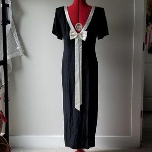 Vintage Retro Pinup 80s black dress with a long white bow on the back